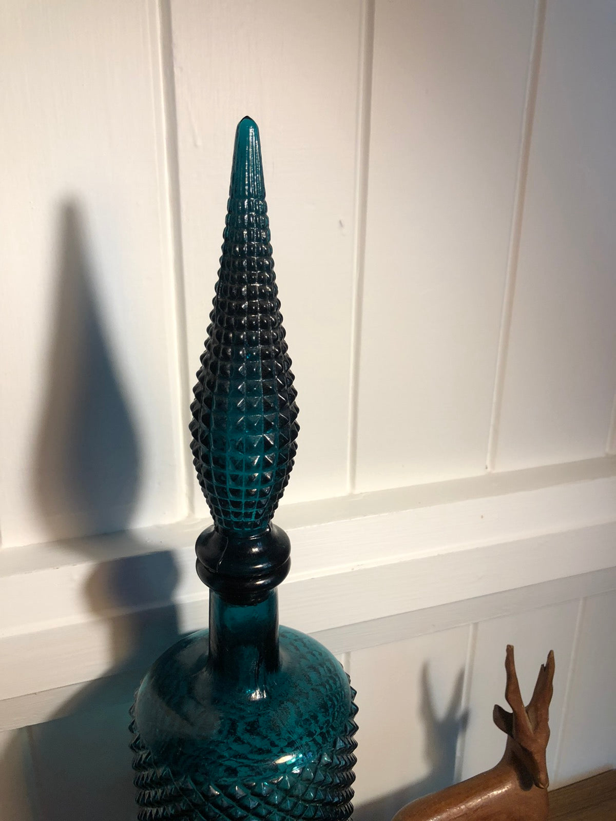 Teal genie bottle